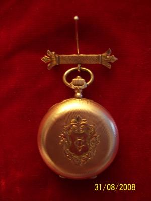 Reloj de bolsillo de oro, foto ampliada en nueva ventana