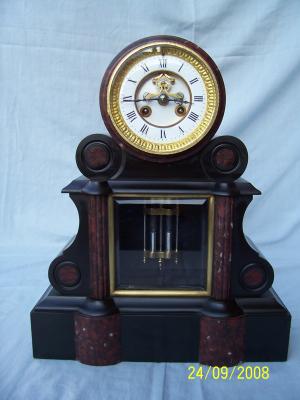 reloj de marmol, foto ampliada en nueva ventana